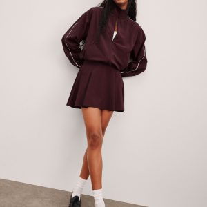 Score Pleated Skirt